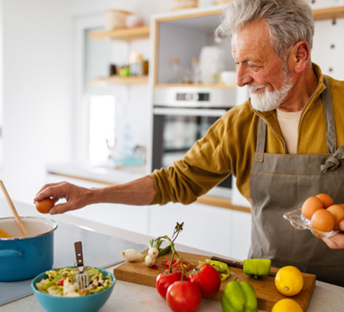 Staten Island patient enjoying favorite foods after implants